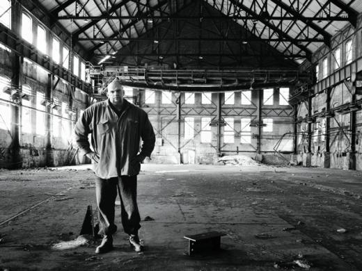 John Fetterman stands inside the defunct Carrie Furnance Works (1884-1982), which he hopes will be turned into  a museum and national park down the river from Braddock.