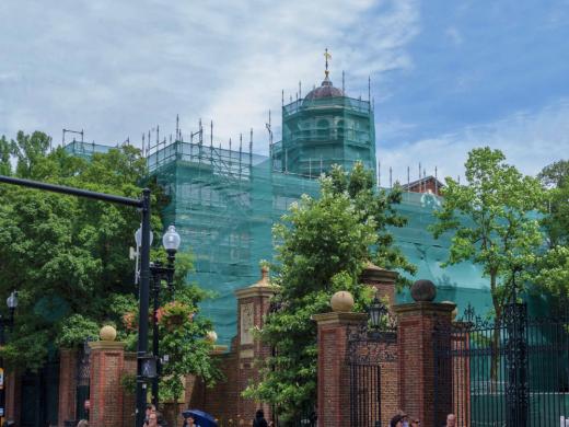 Photograph, renovating Harvard Hall, shown in protective construction wrapping