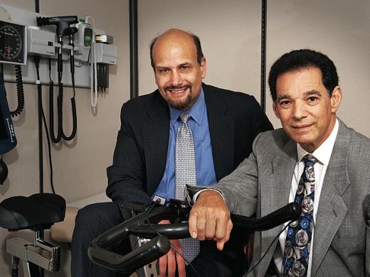 James Katz (left) and Bob Nadelberg with an indoor bicycle at their offices