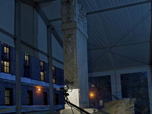 The Peabody Museum's Alexandre A. Tokovinine, a lecturer on anthropology and research associate, is shown at work within a protective tent during the scanning of the Chinese stele—conducted at night for optimal results. 