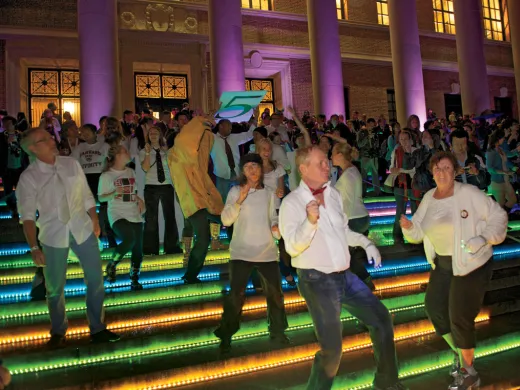 Kicking up their heels: a “flash mob” started off the evening’s dancing with a choreographed routine to the tune of James Brown’s “Papa’s Got a Brand New Bag.”