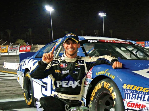 A grinning Staropoli celebrates after winning the NAPA Auto Parts 150 in Irwindale, California, last year.