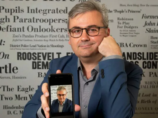 Photo of Geoffrey Fowler with old and new smartphones