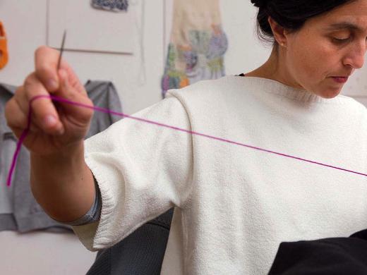 Celia Pym at work with a needle and thread