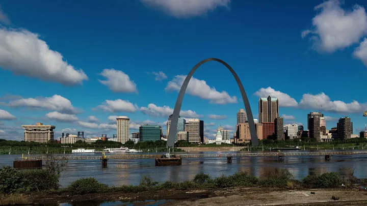 The St. Louis, Missouri, skyline on the Mississippi River with the Gateway Arch visible, as seen from across the Mississippi River in East St. Louis, Illinois 