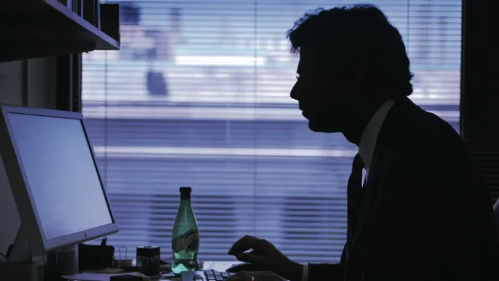 Gawande in his various environments: in his office at the Harvard School of Public Health