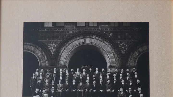 Formal portrait of the Board of Editors for volume 70 of the “Harvard Law Review” (1956-1957), photographed on the steps of Austin Hall. The author, only the third woman admitted to Review membership, stands in the fourth row, at upper left.