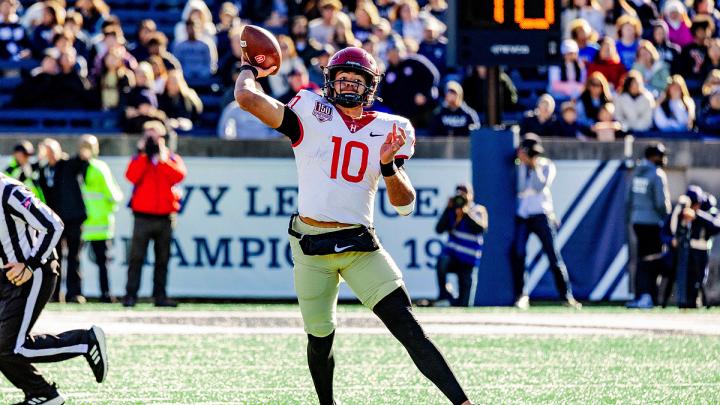 Harvard player throws ball