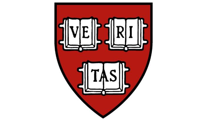 Harvard shield with the Latin word "veritas" meaning truth.