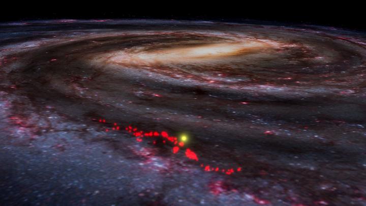 Red dots represent the Radcliffe Wave, superimposed here on an artist's rendering of the Milky Way as it appears in a screen shot taken from WorldWide Telescope.