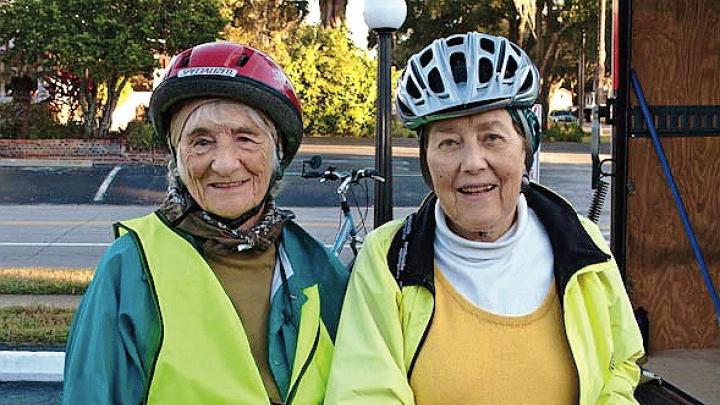 While cycling the East Coast Greenway, Linda Cabot Black and Elizabeth Brody pause for some Florida sunshine. 