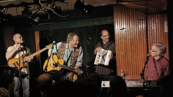 John Forster (at keyboard, right) with Tom Chapin (center) and his band, playing at the Turning Point in Piermont, New  York.