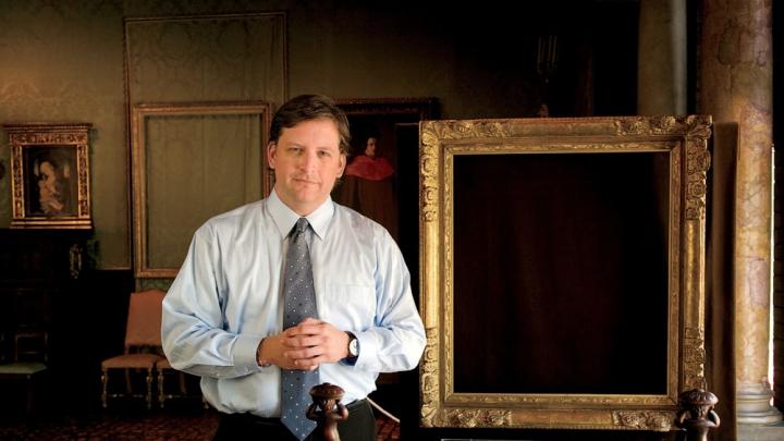 Anthony Amore at the Isabella Stewart Gardner Museum in Boston, with empty frames that held venerable paintings before the 1990 theft