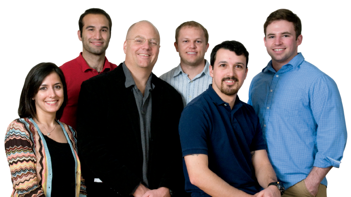 Tarr Family professor of bioengineering and applied physics Kevin “Kit” Parker with some members of his TBI research team (from left): postdoctoral fellow Leila Deravi, doctoral candidate Borna Dabiri ’07, Parker, doctoral candidate Matt Hemphill, lab engineer Josué Gross, and doctoral candidate Sam Felton