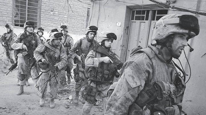 Moulton (at right) leads a mission in Najaf.