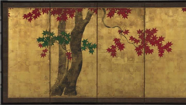 Maple trees with red and green foliage against a gold background