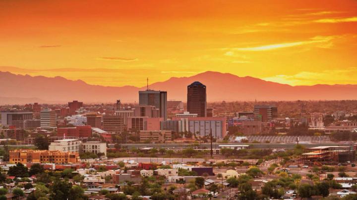 Photograph of the Tucson, Arizona, skyline and downtown taken at sunset.
