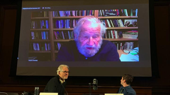 Photograph of Noam Chomsky videoconference at a Harvard Law School event discussing corporate capture of the legal profession