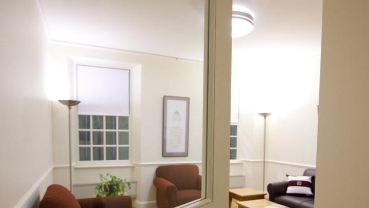 Photograph by Rose Lincoln/Harvard News Office A life-size model of a renovated Old Quincy suite includes a hallway, a "cluster" common room, a bathroom, a single bedroom, and a double bedroom set up in the parking garage at One Western Avenue, where contractors, architects and administrators can tour the mock-up. Click the "right arrow" below or use the arrow buttons on your keyboard to see more images.