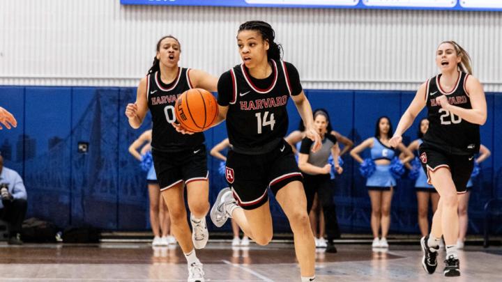 Harmoni Turner dribbles the ball up the court 