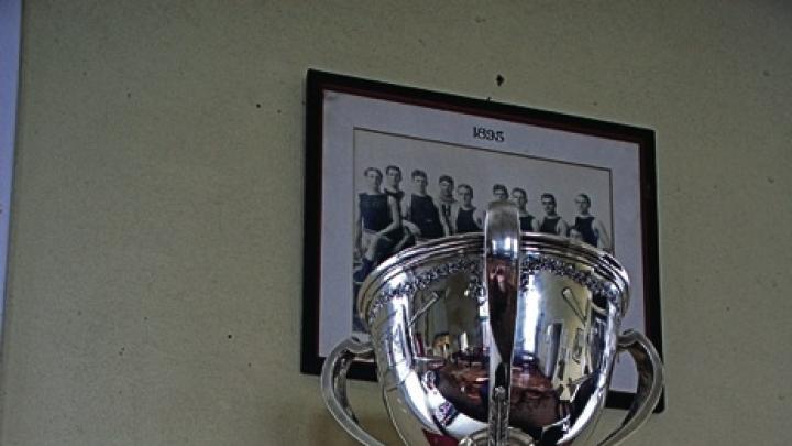 In the Red Top dining hall, the Sexton Cup—given to the winner of the varsity four-miler—outshines more informal croquet awards.