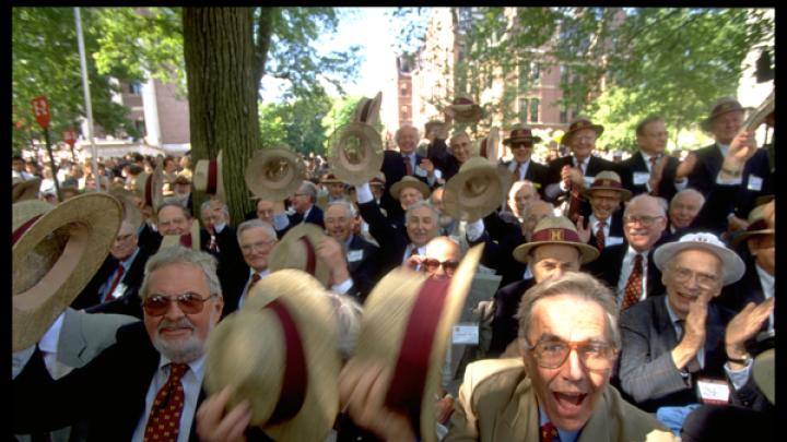 Members of the class of 1948 tip their straw hats in a show of fiftieth-reunion pride.