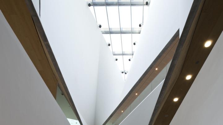 The new building’s 87-foot-high, spiraling “Lightfall” atrium