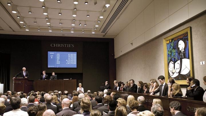 The 1931 Picasso painting <i>Nude, Green Leaves and Bust</i> being auctioned at Christie’s in 2010. The sale price of $106 million set a world record.