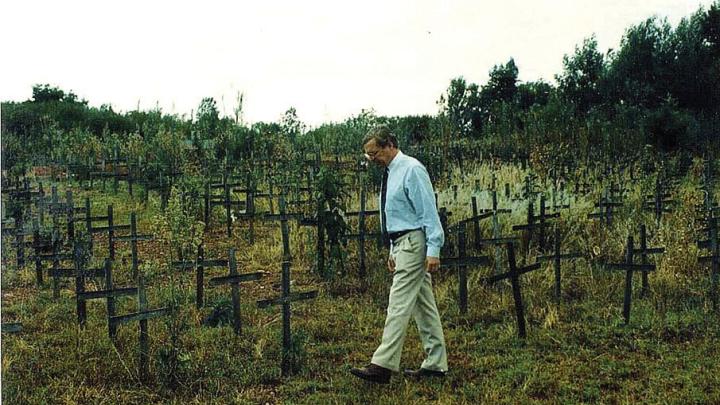 David Scheffer in 1997 at the Nyanza massacre memorial site in Rwanda