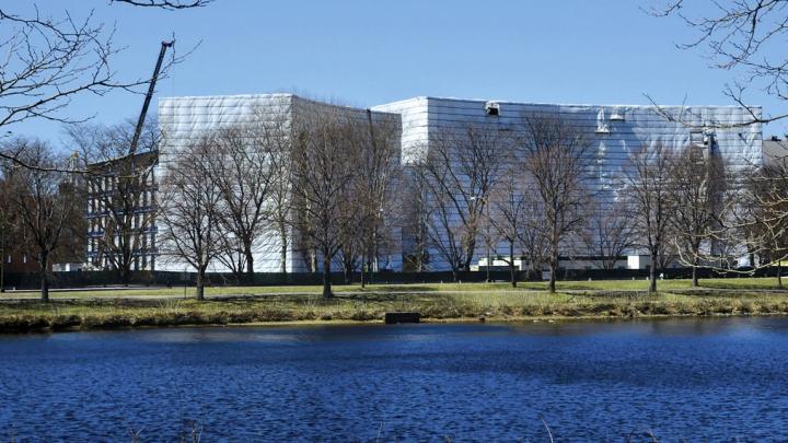 Tata Hall, across the river, under wraps 