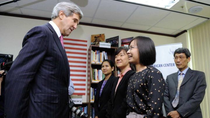 During his first visit to Vietnam as secretary of state, John Kerry met with Fulbright alumnae Tran Thuy Giang (at rear, of Tri Viet Consulting and Investment) and Dang Thi Manh (foreground, of Procter &amp; Gamble Vietnam). Faculty members present included Le Thi Quynh Tram, M.P.A. &rsquo;13 (center), and Pham Duy Nghia, a former Harvard Law School fellow (far right).