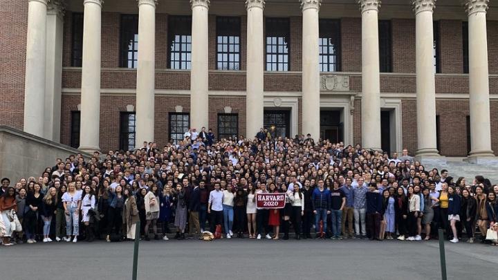 An impromptu senior class photo on the steps of Widener Library