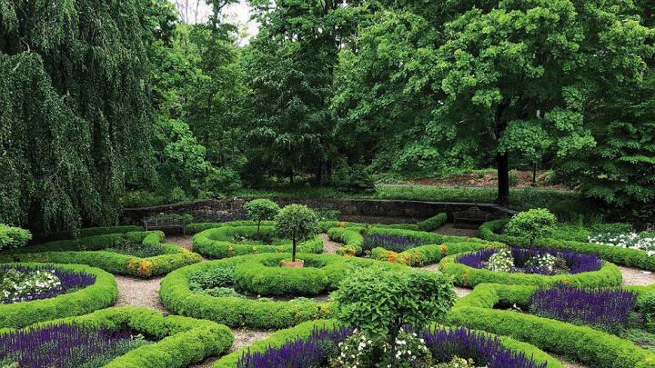 Close up view of the sunken garden’s symmetrical hedges and plants