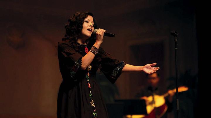 As a singer and songwriter, Claudia García performs mariachi-inspired Latin fusion music.