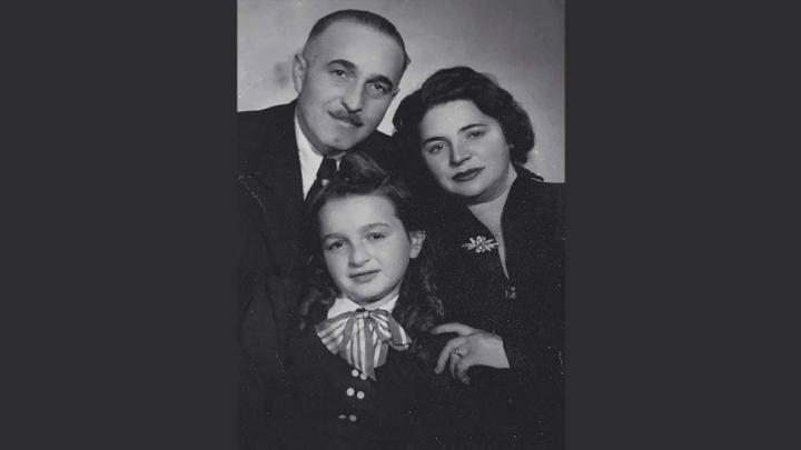 Susan Rubin Suleiman with her parents in 1949; her mother is wearing the silver pin discussed in the book excerpt.