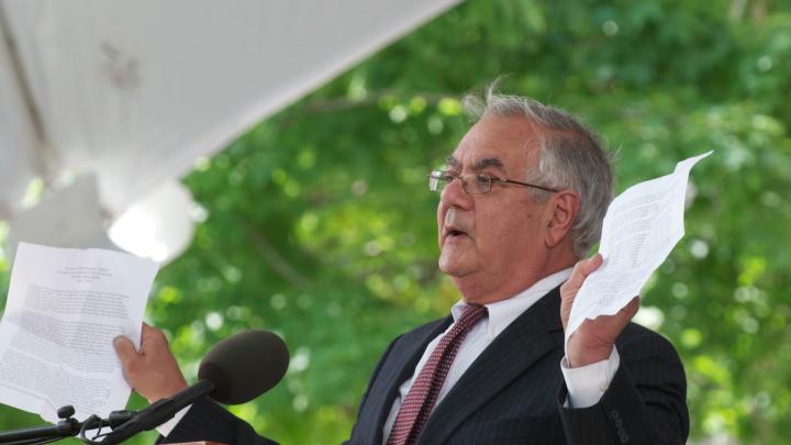 U.S. Representative Barney Frank holding up a copy of the Marshall speech from 1947.