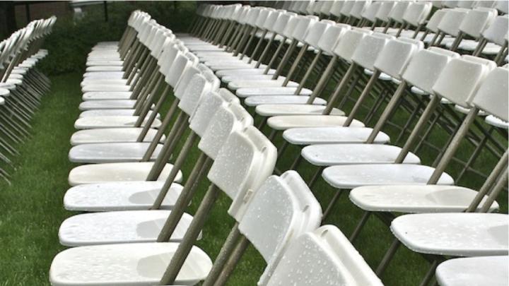 Wet chairs in Harvard Yard Tuesday morning. Rain is forecast for Tuesday, thunderstorms for Wednesday, and sun on Thursday.