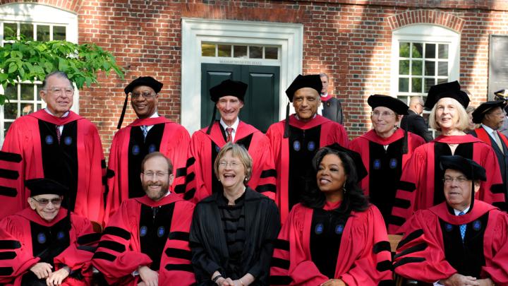 Front row from left: José Antonio Abreu, Provost Alan Garber, President Drew Faust, Oprah Winfrey, and Thomas M. Menino. Back row from left: C. (Clemmie) Dixon Spangler Jr, Donald R. Hopkins, Lord Robert M. May, Sir Partha Dasgupta, JoAnne Stubbe, and Elaine Pagels.