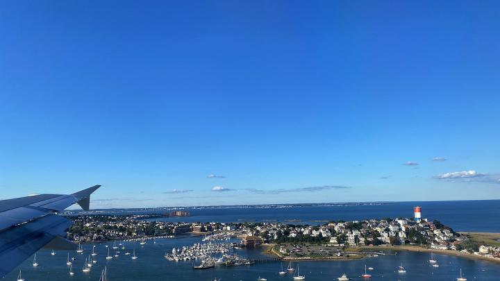 Photograph of boats at anchor on the approach to Boston’s Logan Airportn