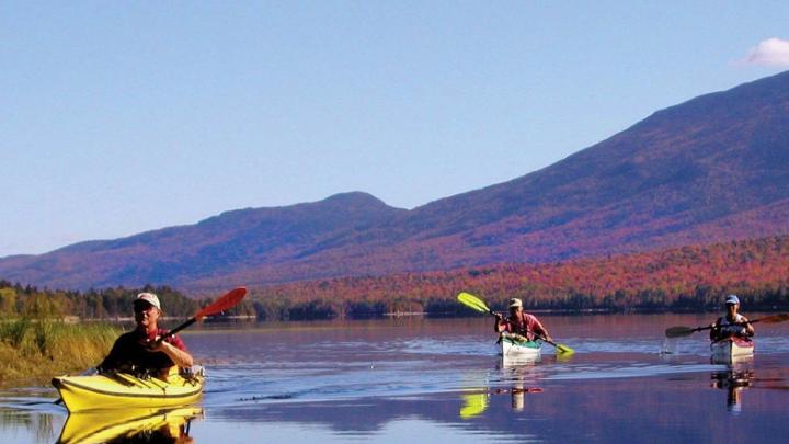 Paddlers enjoy the serenity of Flagstaff Lake, Maine.