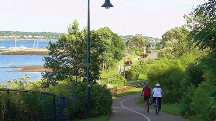 Cyclists of all levels can enjoy the coastal Eastern Promenade Trail in Portland.
