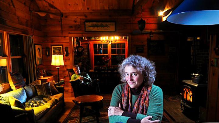 Joanne Ricca at her lakeside home in rural Maine with husband Martin Bartlett.
