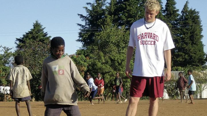 Varsity midfielder Adam Rousmaniere ’10 also volunteered with the program last summer, in Malawi.