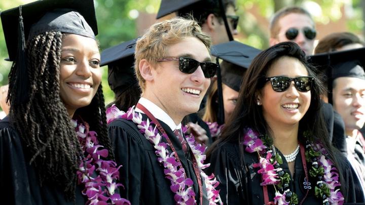 Dressed, and dressed up, to get their degrees: Eliot House-mates Janet Yarboi ’12, Eddie Grom ’12, and Lindsay Louie ’11 