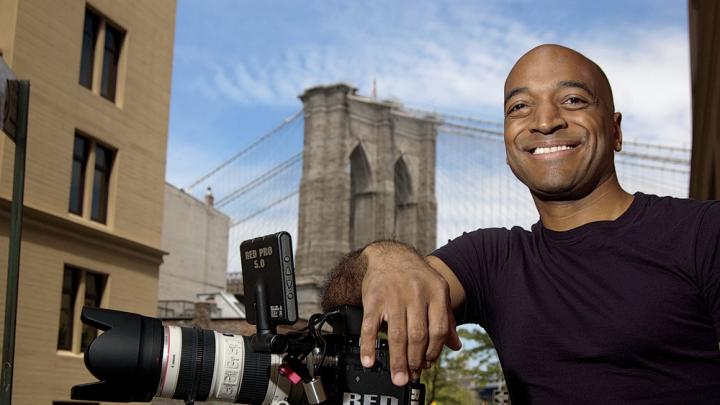 Film director Mustapha Khan near his home and studio, in the shadow of the Brooklyn Bridge 