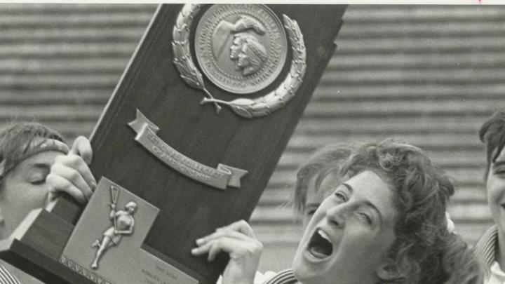 Julie Smail ’90 celebrates the Crimson’s winning of the NCAA national championship.