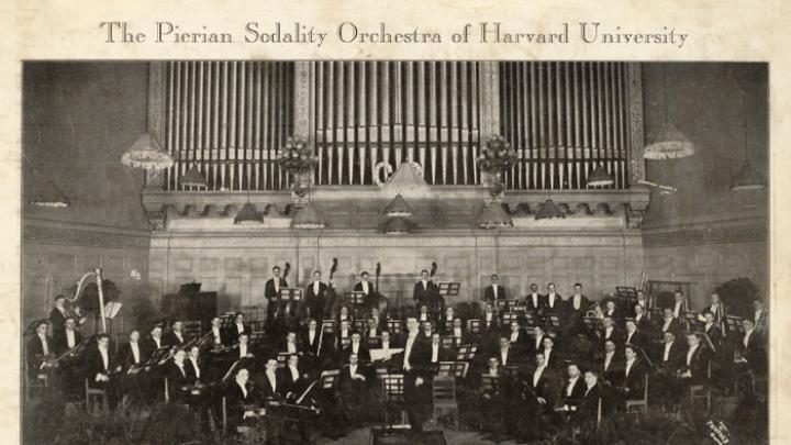 This photograph, from a scrapbook collecting items from 1929 to 1950, depicts the "Pierian Sodality Orchestra" at Boston's Symphony Hall.