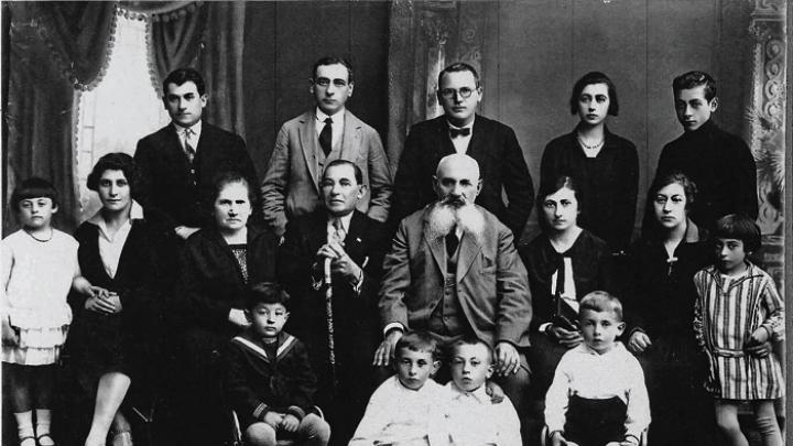 The Levy family in 1928; Jacob holds the cane. Only he and Rivka Levy (far left, flounced dress) survived the Nazis.