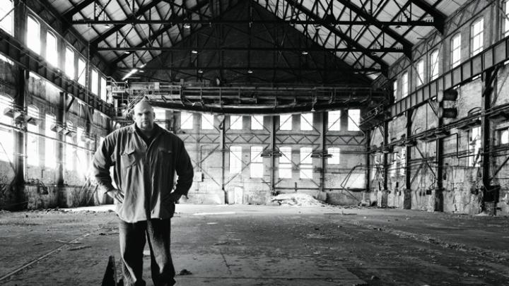 John Fetterman stands inside the defunct Carrie Furnance Works (1884-1982), which he hopes will be turned into  a museum and national park down the river from Braddock.