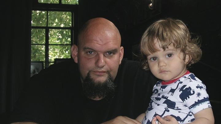 Fetterman at home with his young son, Karl